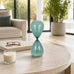Bombara Teal Hourglass Decorative Object – Small Transparent Glass Sand Timer Modern Home Decor Accent – Shelf & Coffee Table Decor for Office & Living Room – 14", Blue & Green